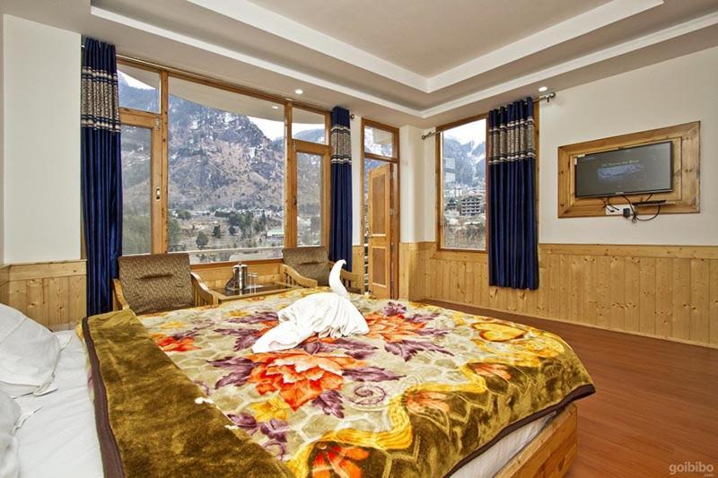 Hotel Uday Himalaya Манали Экстерьер фото