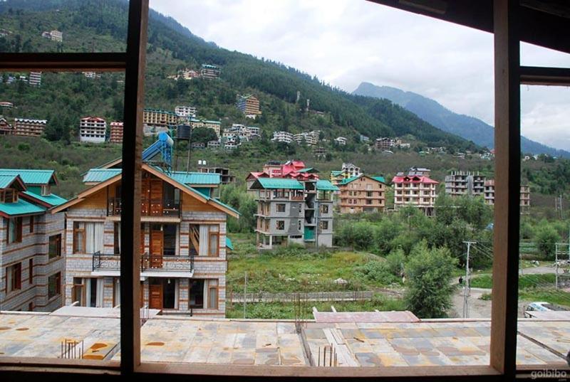 Hotel Uday Himalaya Манали Экстерьер фото