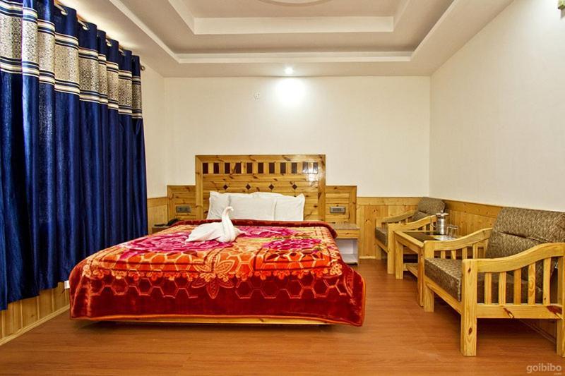 Hotel Uday Himalaya Манали Экстерьер фото